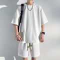Completo uomo Valstrend in maglia a nido d'ape con pantaloncini corti a maniche corte, stile casual e comodo.
