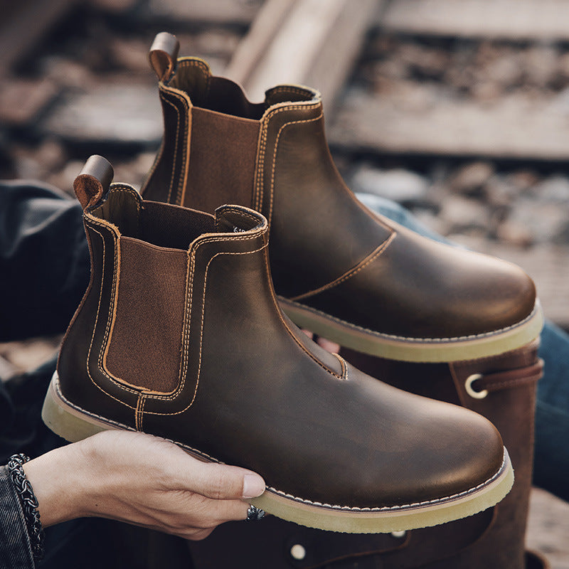 Stivali Chelsea casual da uomo in stile britannico Dr Martens, con suola robusta e design classico, blu scuro.