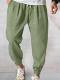 Joggers da uomo Valstrend in tessuto lavato e strappato, pantaloni casual con tasche, vita bassa e cinturina a coulisse.
