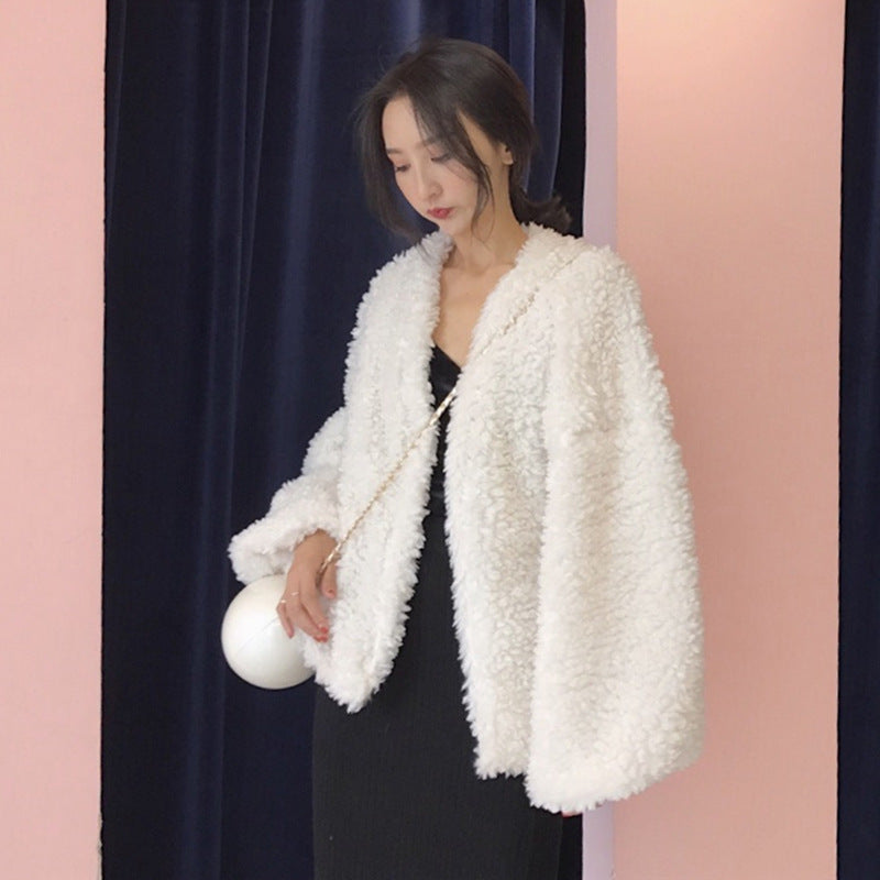 Maglione in lana di agnello per donna, colore unico, stile coreano, elegante e caldo, con dettagli raffinati.