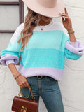 Maglione da donna a blocchi di colore con scollo rotondo, maglieria Valstrend, dettagli vivaci e stile casual.