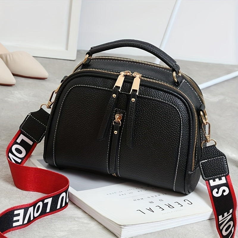 Borsa a tracolla casual da donna Valstrend in similpelle, con tracolla regolabile, chiusura a zip e stampa casual.
