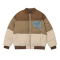 Cappotto uomo Valstrend con patchwork a contrasto di colori, stile moderno e caldo, vista frontale con dettagli colorati e cuciture.