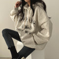 Giacca imbottita in pile spesso da donna autunno-inverno con cappuccio con lettere, stile casual Valstrend.