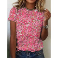 T-shirt donna a maniche corte con stampa floreale, top Valstrend, tessuto leggero e stile femminile.