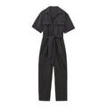 Completo donna Valstrend con cintura, zip e colletto, maniche corte, stile primaverile, tessuto leggero e moderno.