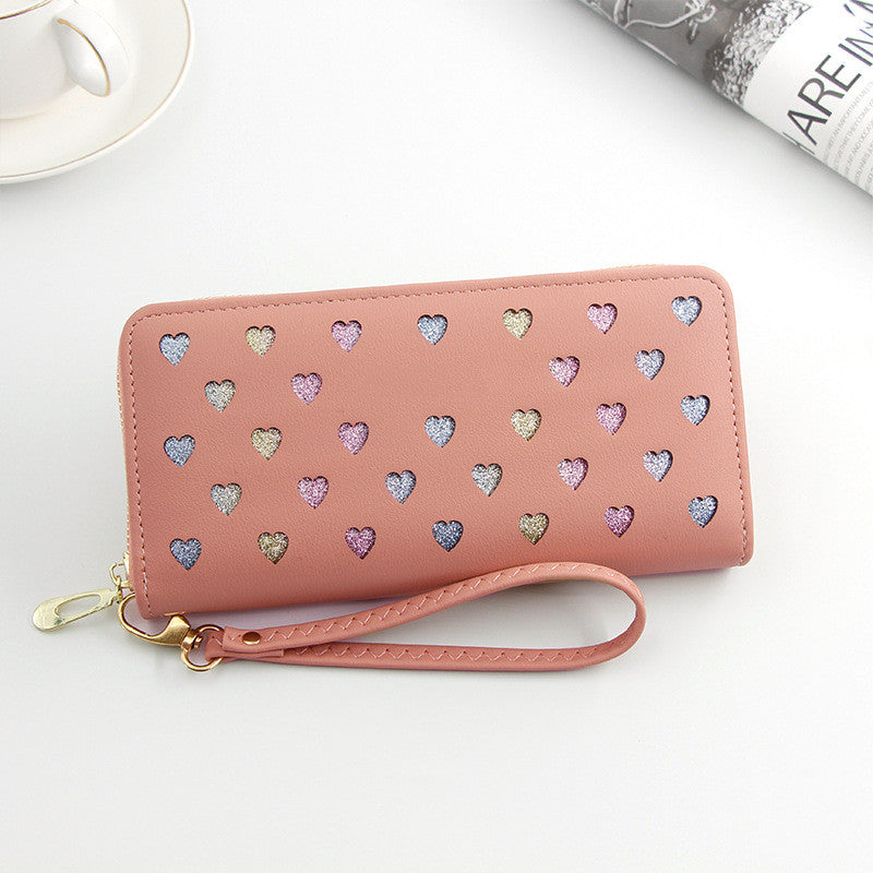 Portafoglio donna Valstrend con zip, grande capacità e design elegante, ideale per mantenere carte e denaro organizzati.