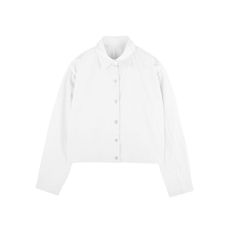 Camicia lunga slim a maniche lunghe in cotone elasticizzato color solid, marca Valstrend shop, con vita elasticizzata e stile elegante.