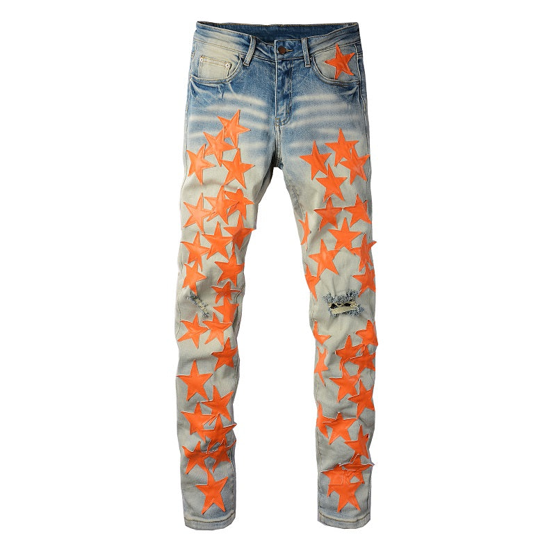 Jeans da uomo leggeri arancioni Star perforati, stile europeo e americano, di marca Valstrend shop, visibili in primo piano.