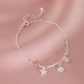 Bracciale femminile Valstrend con stelle marine e conchiglie stile seaside, accessorio fashion mare e spiaggia.