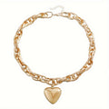 Collana con pendente a cuore in oro placcato 18K e catena vuota in acciaio inox, ideale per uso quotidiano e feste.