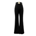 Pantaloni slim fit a vita alta neri Valstrend, vestibilità aderente e tessuto elasticizzato, vista frontale su sfondo neutro.