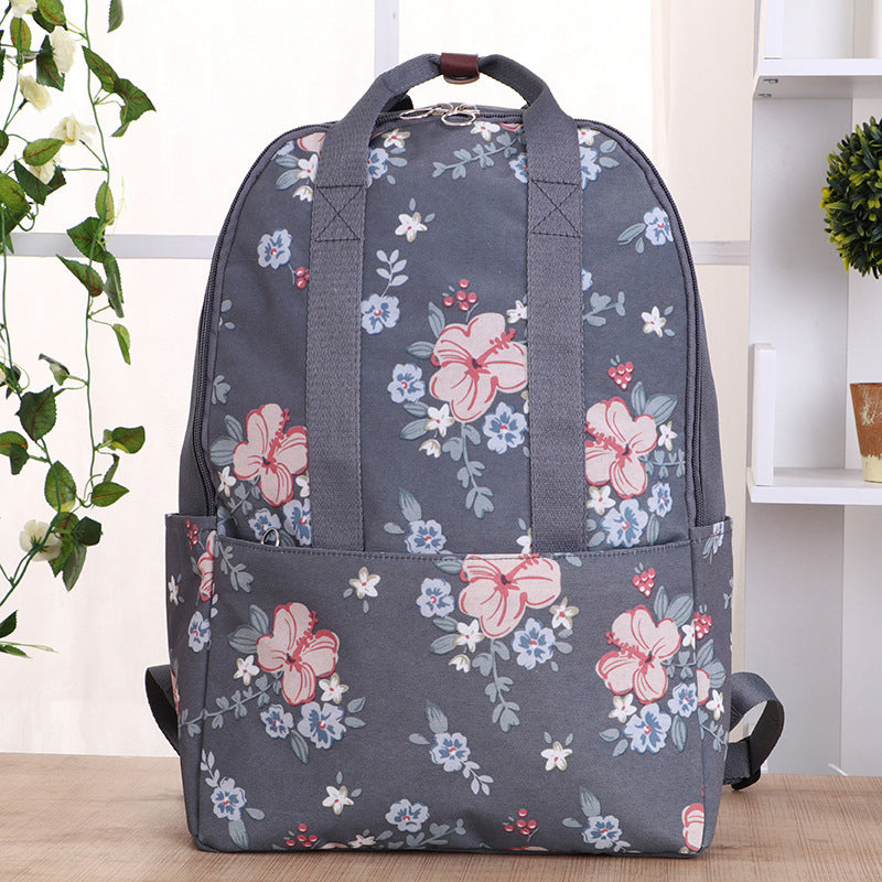 Zaino da viaggio impermeabile coreano Valstrend, resistente all'acqua con scomparti spaziosi e design compatto, ideale per viaggi.