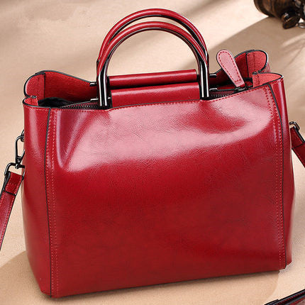 Borsa tote multifunzionale in vera pelle bovina da donna, stile elegante e capiente, con dettagli naturali in pelle marrone.
