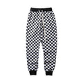 Pantaloni a quadretti bianco e nero Valstrend Shop, stile classico a scacchi, con taglio comodo e tessuto morbido.