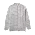 Maglione femminile invernale Valstrend con decorazioni a rivetto e motivo intrecciato per l'autunno, vista frontale.