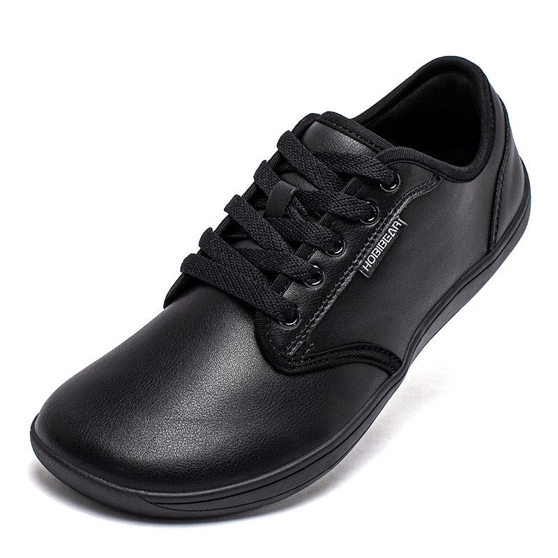 Scarpe sportive e da tempo libero Valstrend, resistenti alle macchie, con punta ampia per uomini, in nero.