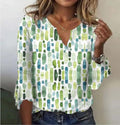 T-shirt donna Valstrend con scollo a V, maniche a sbuffo a campana e taglio svasato, tessuto morbido e femminile.