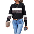 Maglione donna con collo rotondo, stampa leopardata e blocchi di colore, marca Valstrend shop, vista frontale.