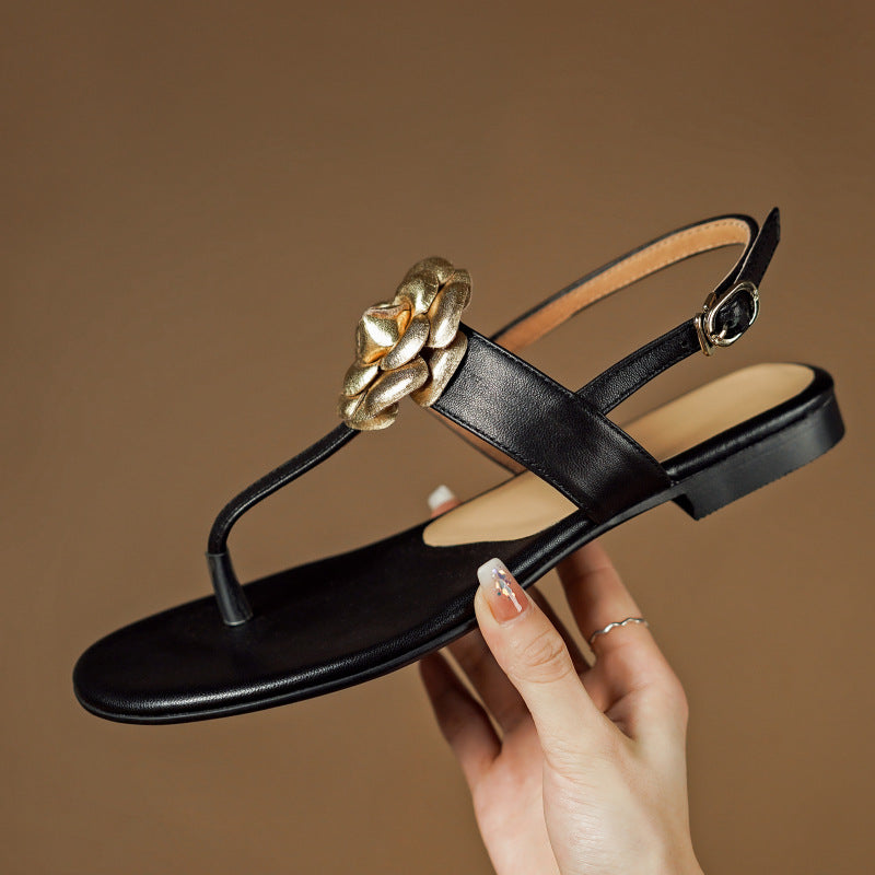 Sandali donna Valstrend con punta aperta, stile preppy, in pelle di pecora, con fiore decorativo e design flip-toe.