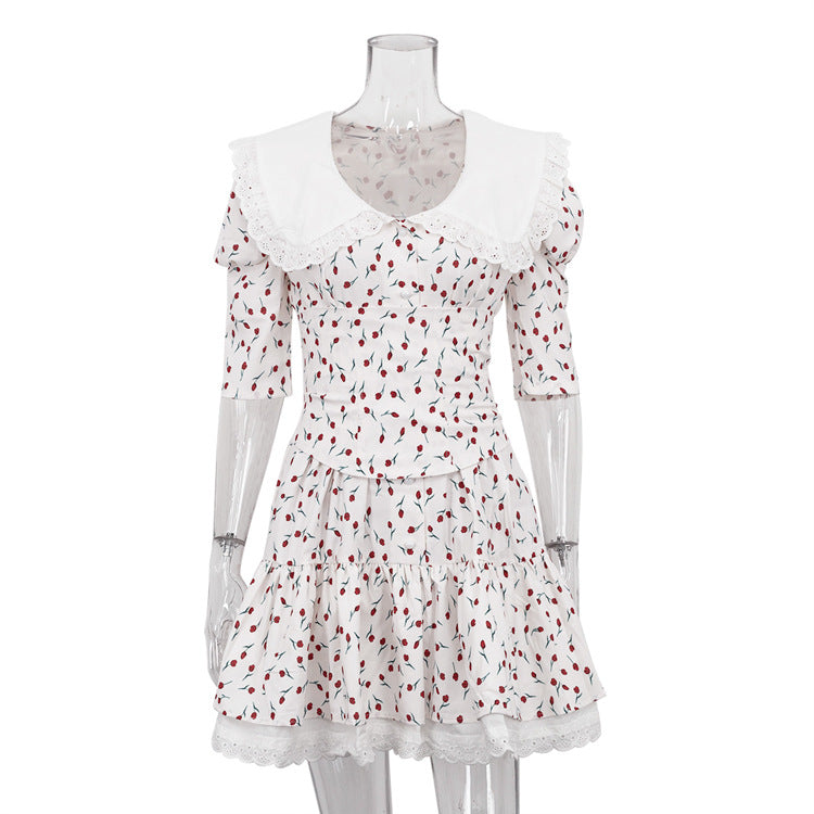 Vestito floreale con colletto Peter Pan a maniche corte, vita stretta e gonna Pettiskirt, stile elegante e alla moda.
