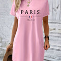 Vestito T-shirt casual donna Valstrend con stampa PARIS, nero e bianco, collo rotondo, maniche corte, tessuto elasticizzato.