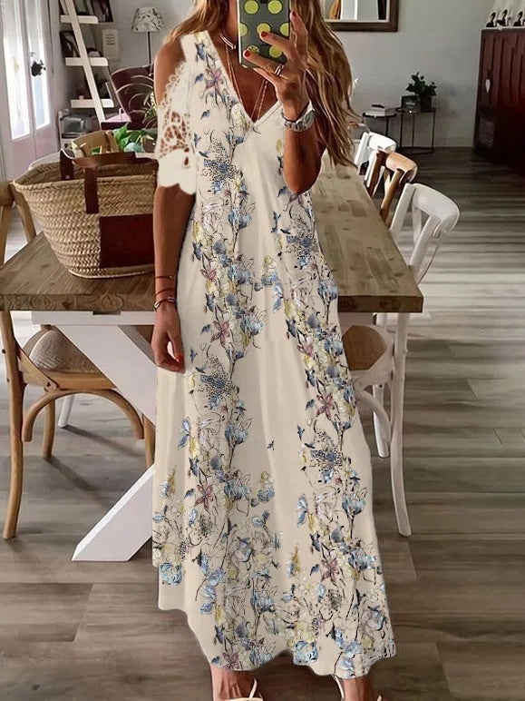 Vestito estivo bohemien da donna Valstrend con stampa floreale, maniche corte e design leggero e colorato.