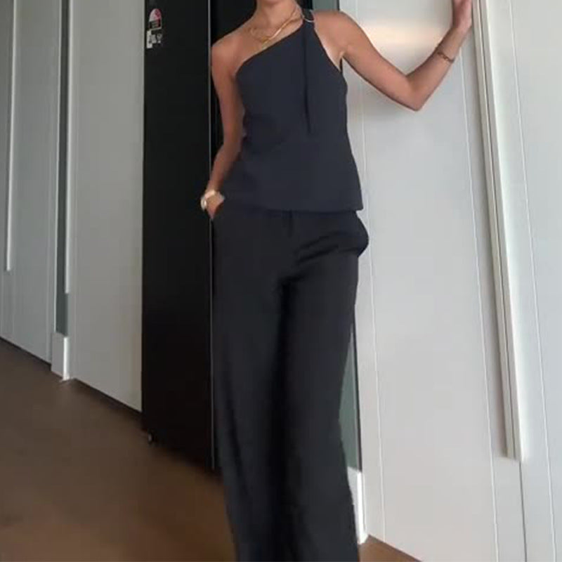 Set donna due pezzi Valstrend con top a collo diagonale e pantaloni larghi a tinta unita, vestibilità morbida e comoda.