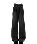 Jeans neri vintage a vita alta per donna Valstrend, modello ampio e casual, con dettagli di stile retrò.