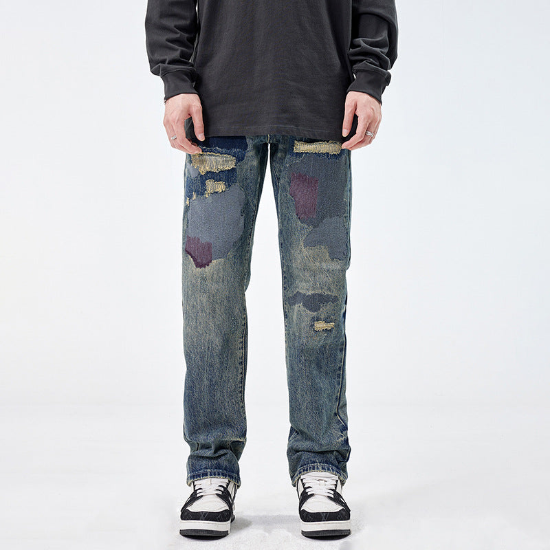 Pantaloni in denim stile americano per uomo, larghi e strappati, con patch dallo stile retrò, marca Valstrend.