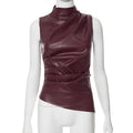 Colletto in pelle donna Valstrend con maniche corte a scalare e vita, stile elegante e moderno in dettaglio visibile.