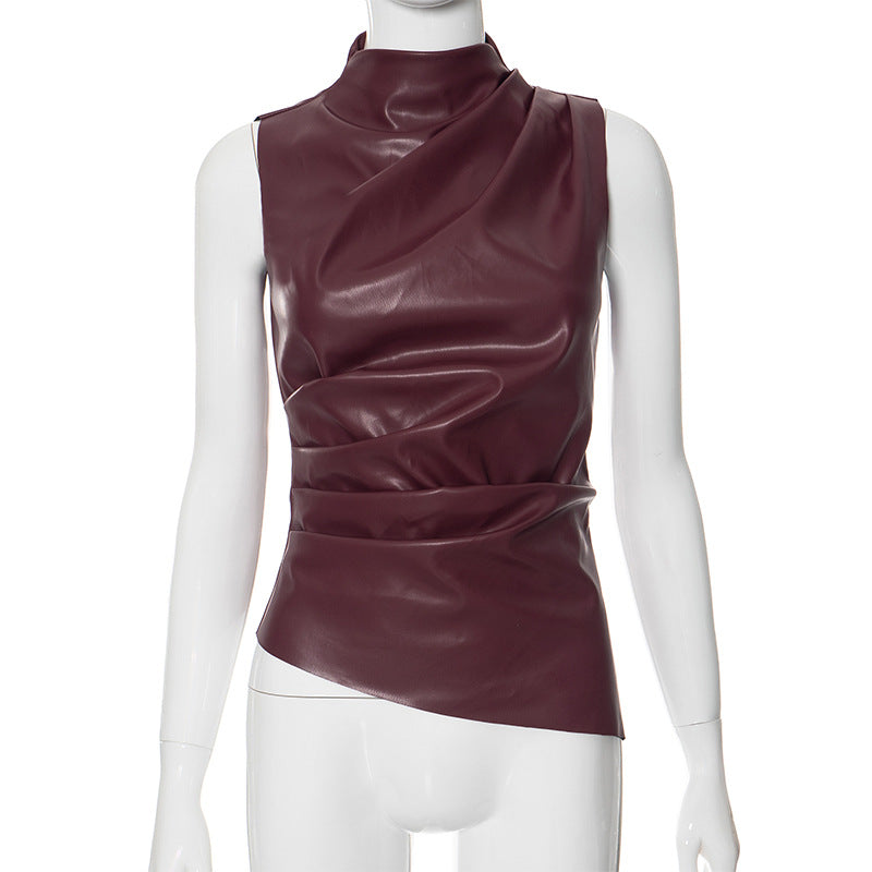 Colletto in pelle donna Valstrend con maniche corte a scalare e vita, stile elegante e moderno in dettaglio visibile.