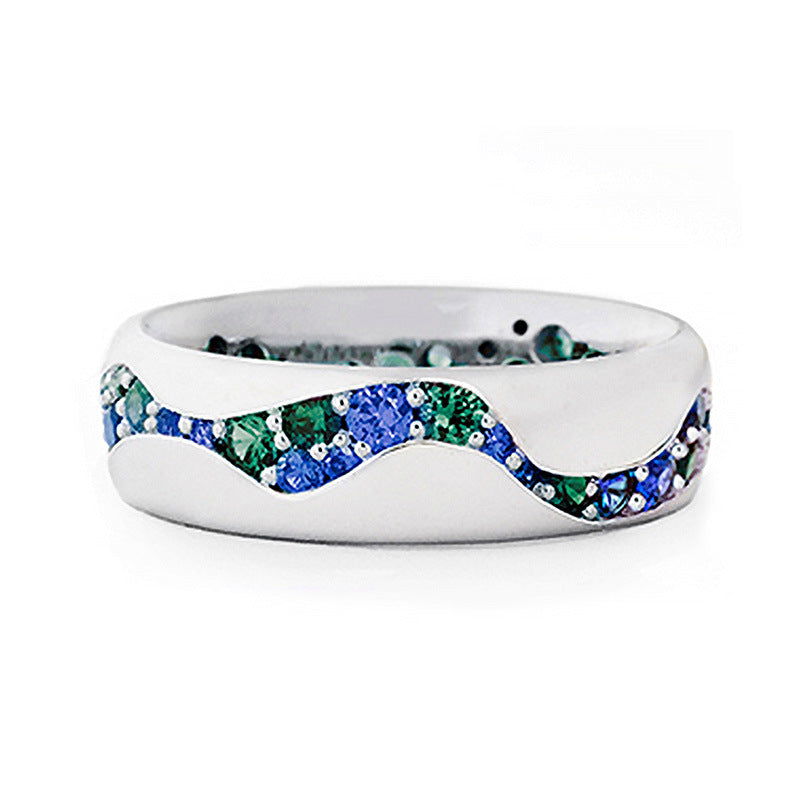 Anello da coppia in zircobio blu-verde di Valstrend, con due anelli intrecciati e dettagli lucidi, simbolo di amore e unità.