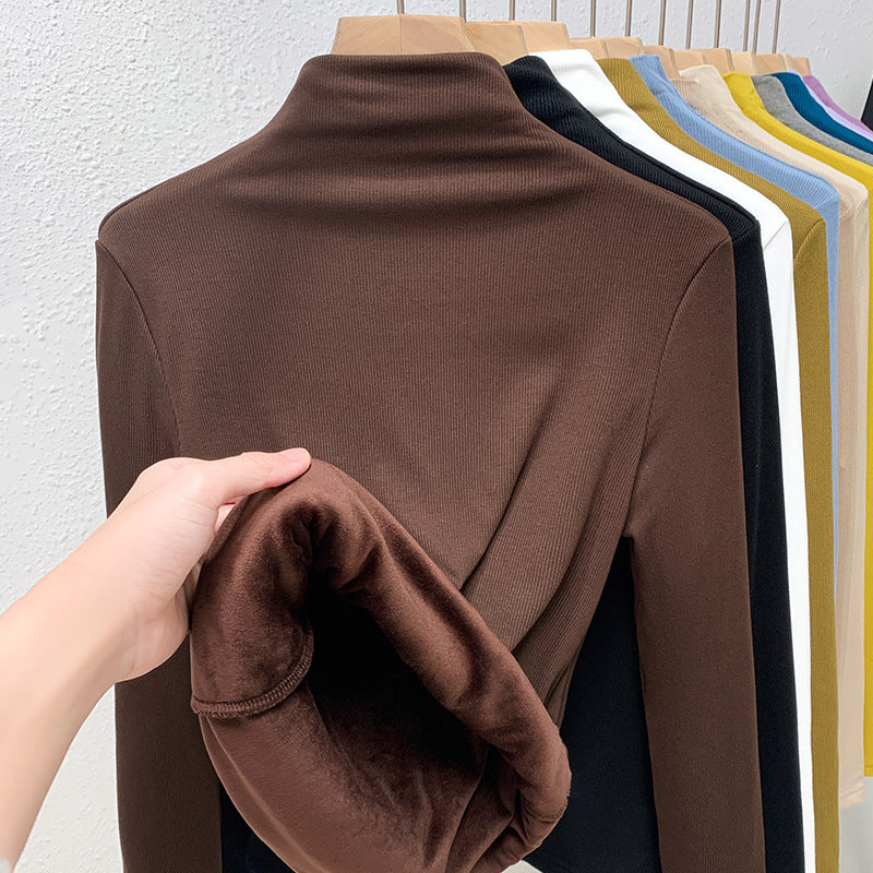 Maglietta aderente in stile Western Valstrend, a maniche lunghe, tessuto stretch, vita alta, vestibilità comoda e moderna.