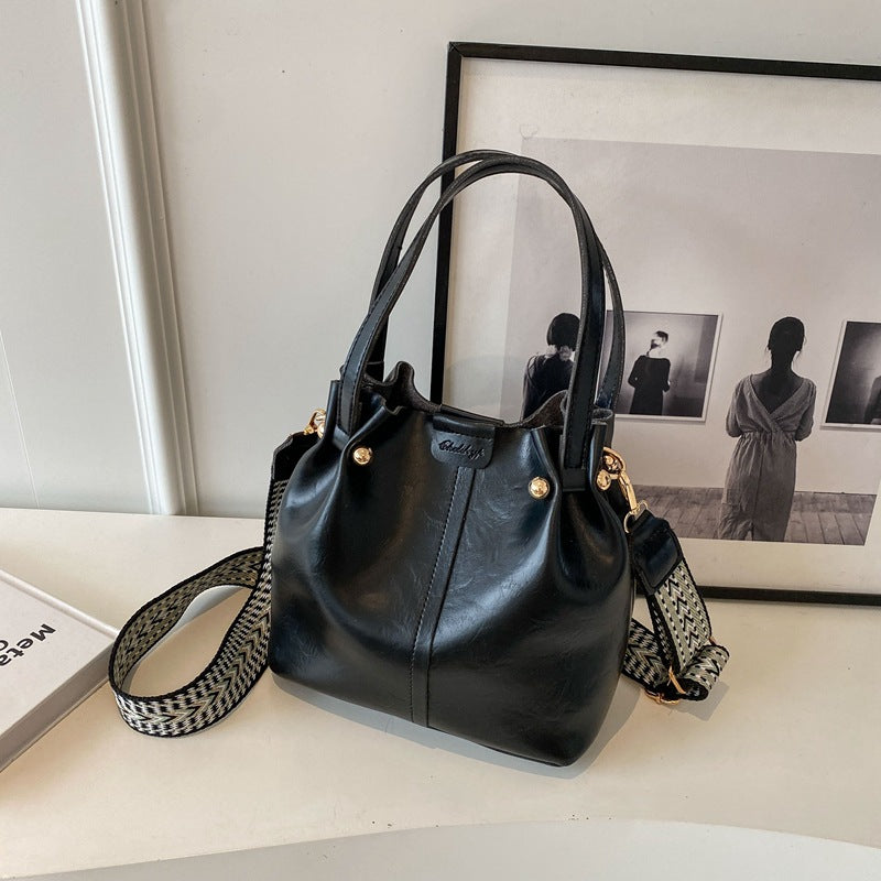 Borsa a spalla grande Valstrend, borsa portatile alla moda con capacità ampia e design pratico per spostamenti quotidiani.