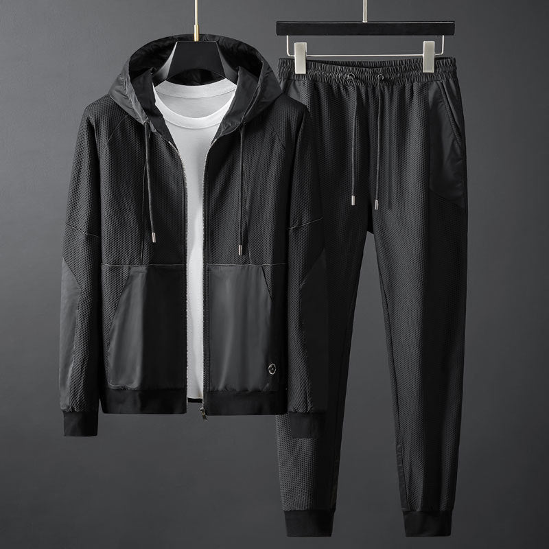 Completo sportivo e da tempo libero da uomo Valstrend, giacca slim-fit con cappuccio e pantaloni coordinati in tessuto elasticizzato