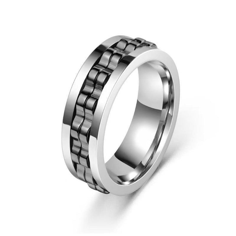 Anello in acciaio inossidabile con texture quadrata e rotazione, anello fidget in titanio per uomo, design elegante e moderno.