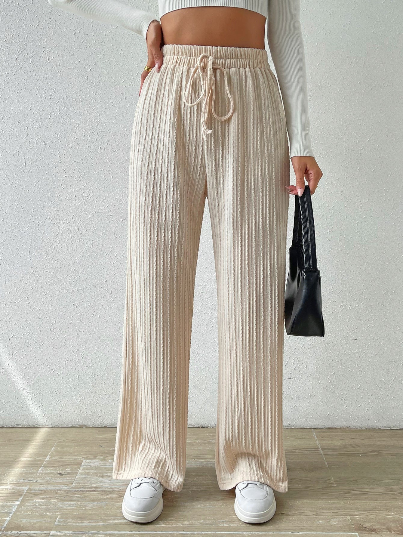 Pantaloni larghi in maglia a trama texture con cintura annodata per donna, stile Valstrend shop.