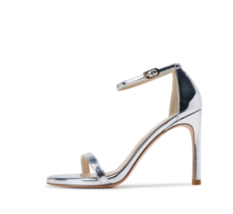 Sandali donna con tacco a stiletto Valstrend, cinturino alla caviglia con fibbia e design elegante.