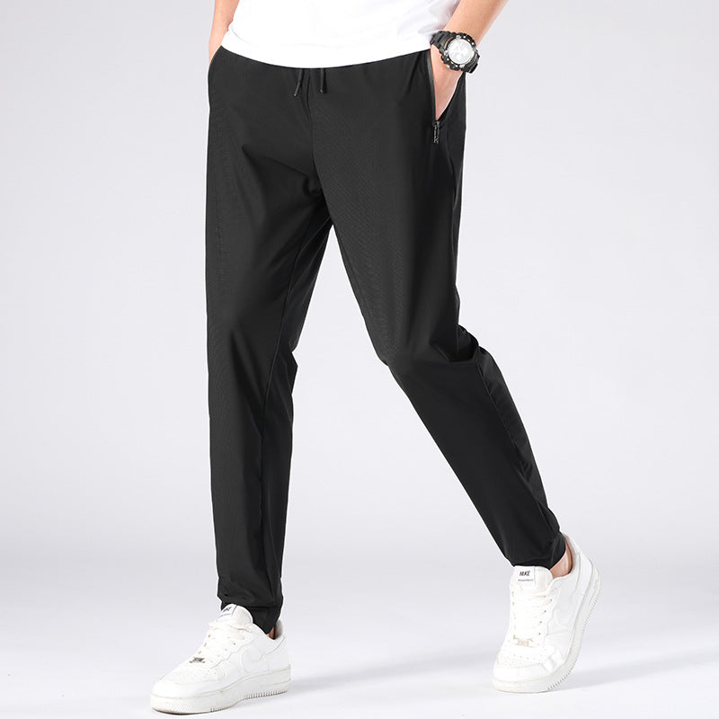 Pantaloni sportivi da uomo Valstrend in seta ice estiva, taglie comode, tessuto rapido asciugatura, ideali per attività sportive.