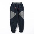 Pantaloni harem a contrasto Valstrend shop, stile comodo e alla moda con dettagli distintivi, visibili nell'immagine.
