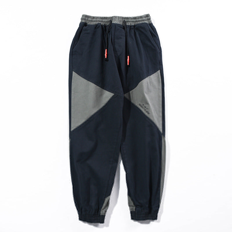 Pantaloni harem a contrasto Valstrend shop, stile comodo e alla moda con dettagli distintivi, visibili nell'immagine.