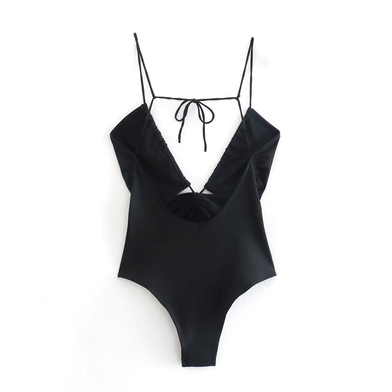 Pantaloni aderenti neri sexy da donna, jumpsuit aperto in tessuto elastico, indossati da una modella, marchio Valstrend.