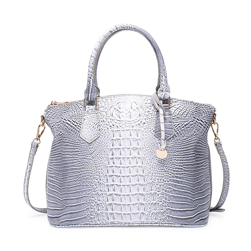 Borsa a tracolla donna Valstrend con motivo rettile retrò, portatile e compatta, elegante e resistente.