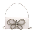 Borsa donna a fiocco Valstrend Shop, elegante con manico e dettagli decorativi, ideale per look femminili e sofisticati.