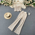 Completo donna Valstrend con top a maniche corte a collo quadrato e pantaloni a campana a vita alta con design vuoto.