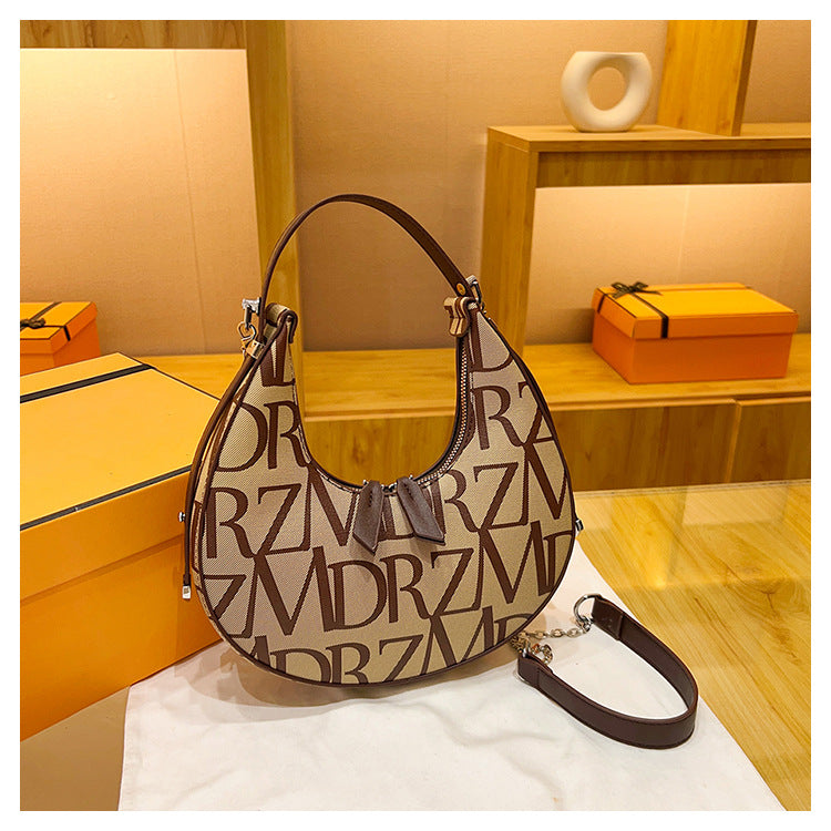 Borsa a tracolla Valstrend in tessuto con stampa alla moda, con manici sottoascellare e design pratico e alla moda.