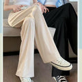Pantaloni casual donna a vita alta, modello dritto e rilassato, marca Valstrend, in tessuto leggero e comodo.