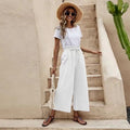 Pantaloni larghi in cotone e lino con cintura elastica, colore solido, vestibilità cropped e comoda, di Valstrend shop.