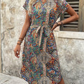 Abito midi elegante floreale Valstrend con scollo a V, maniche corte e orlo asimmetrico, tessuto in poliestere lavabile in lavatrice.